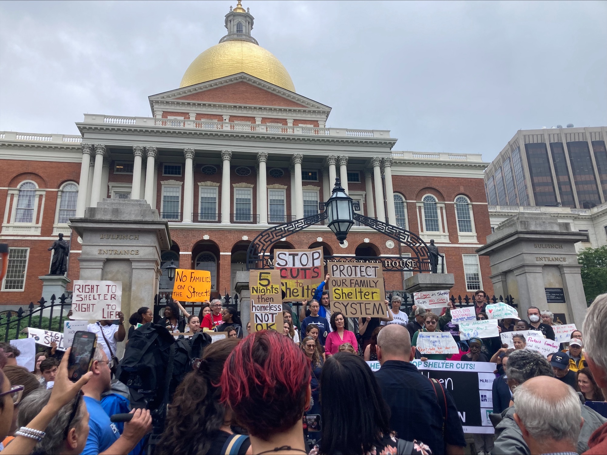 Activists in front of the Massachusetts Statehouse