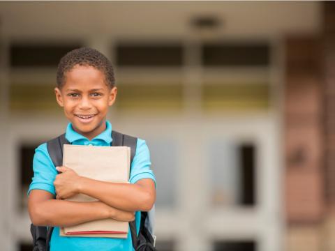 young boy ready for school - istock image